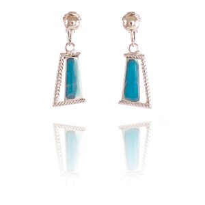 Rodney Holman bias-cut dangle clip-on earrings with inset ridging and a blue enamel panel